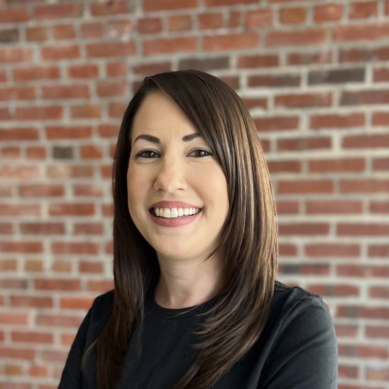 Headshot of Courtney Muller, VP of People Ops at SVT Robotics