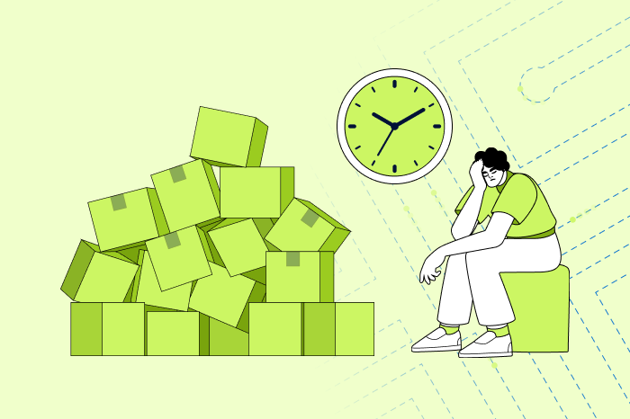 Illustration of worker frustrated because a system is down. They are surrounded by boxes piling up and a clock, showing the importance of needing to reduce downtime.